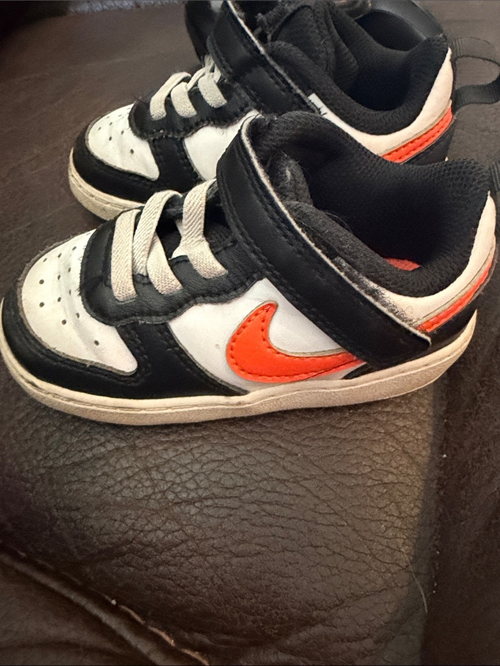 Nike Kids Black and White Sneakers with Orange Swoosh - Picture 3 of 5